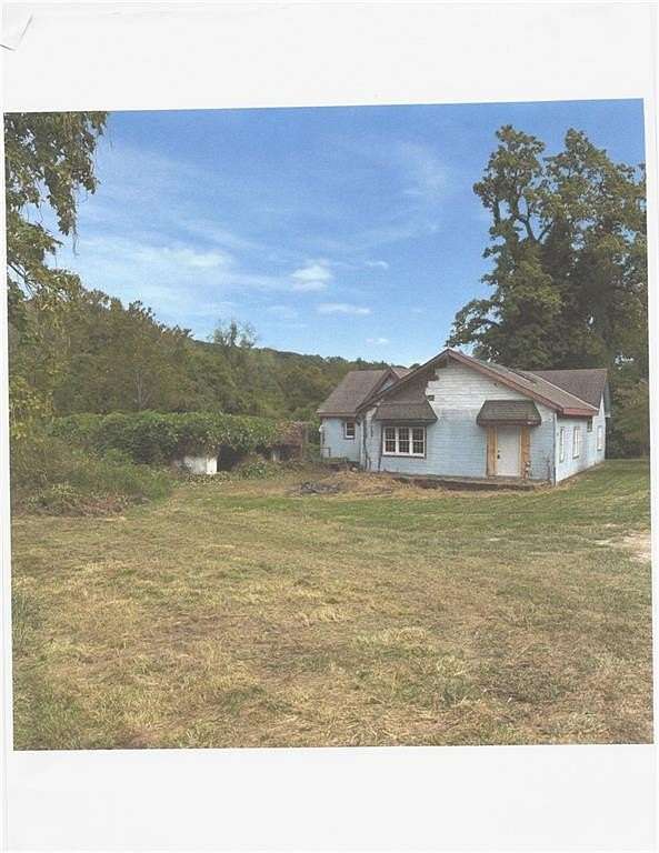 4.37 Acres of Land with Home for Sale in Independence, Missouri