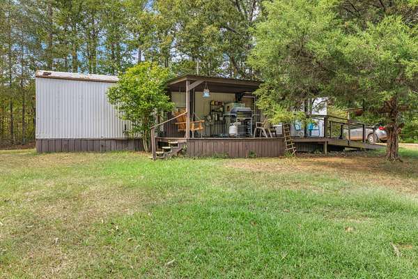 8.1 Acres of Land with Home for Sale in Saltillo, Mississippi