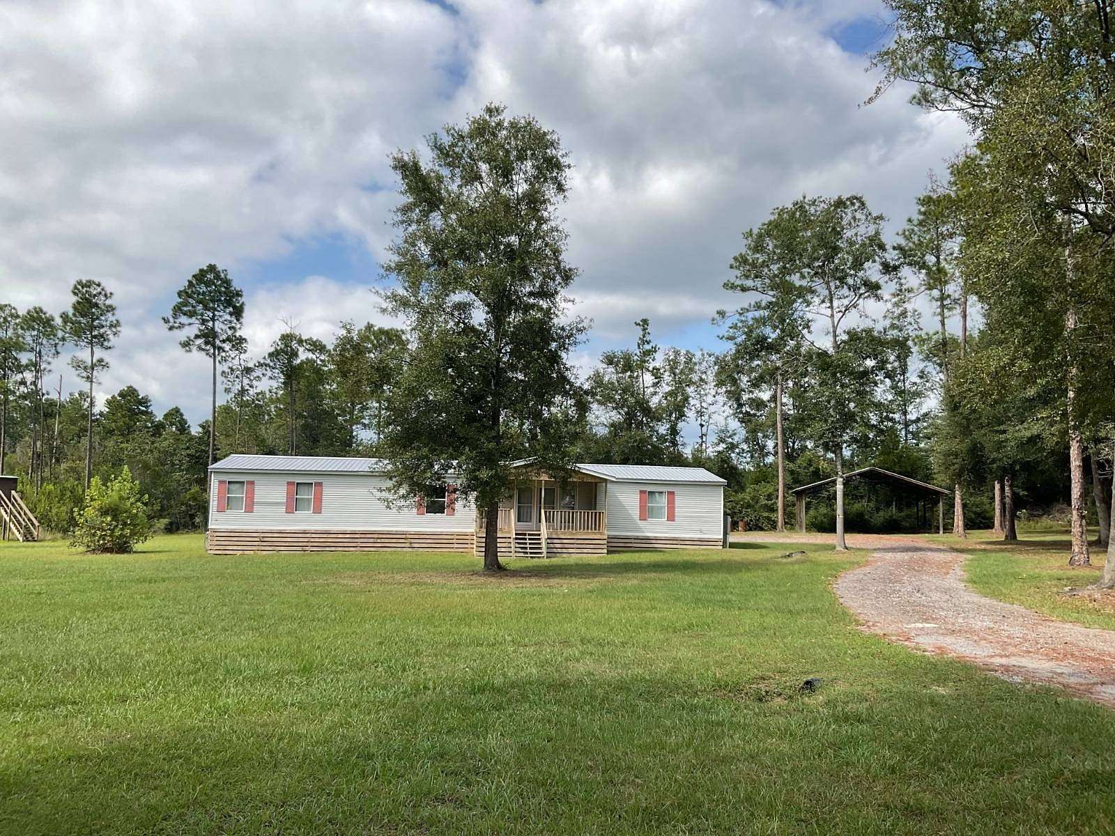 8.42 Acres of Land with Home for Sale in Bonifay, Florida