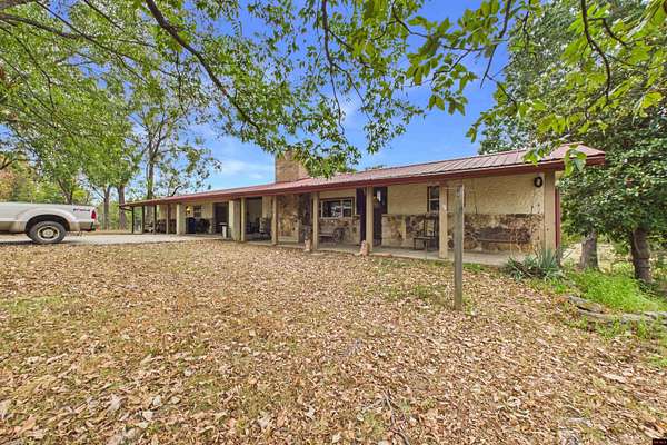 240 Acres of Agricultural Land with Home for Sale in Gainesville, Missouri