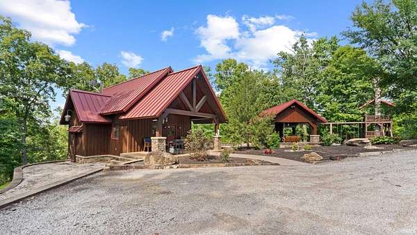 63.3 Acres of Recreational Land with Home for Sale in Orleans, Indiana
