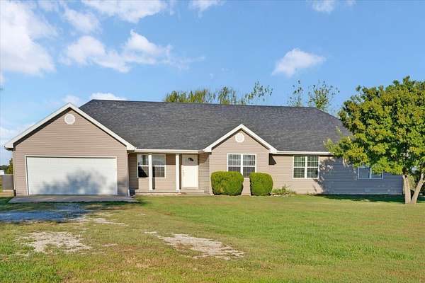 6.35 Acres of Land with Home for Sale in Collins, Missouri