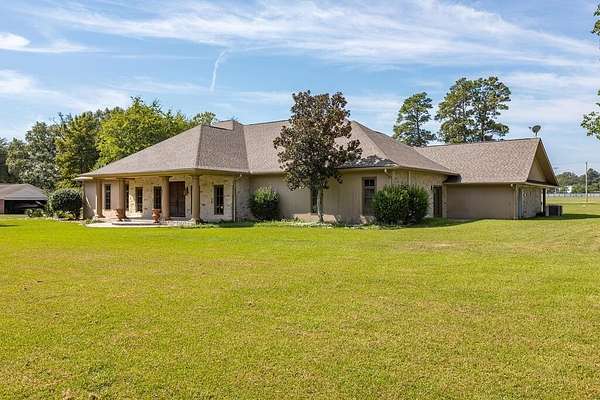 3.78 Acres of Land with Home for Sale in Huntington, Texas