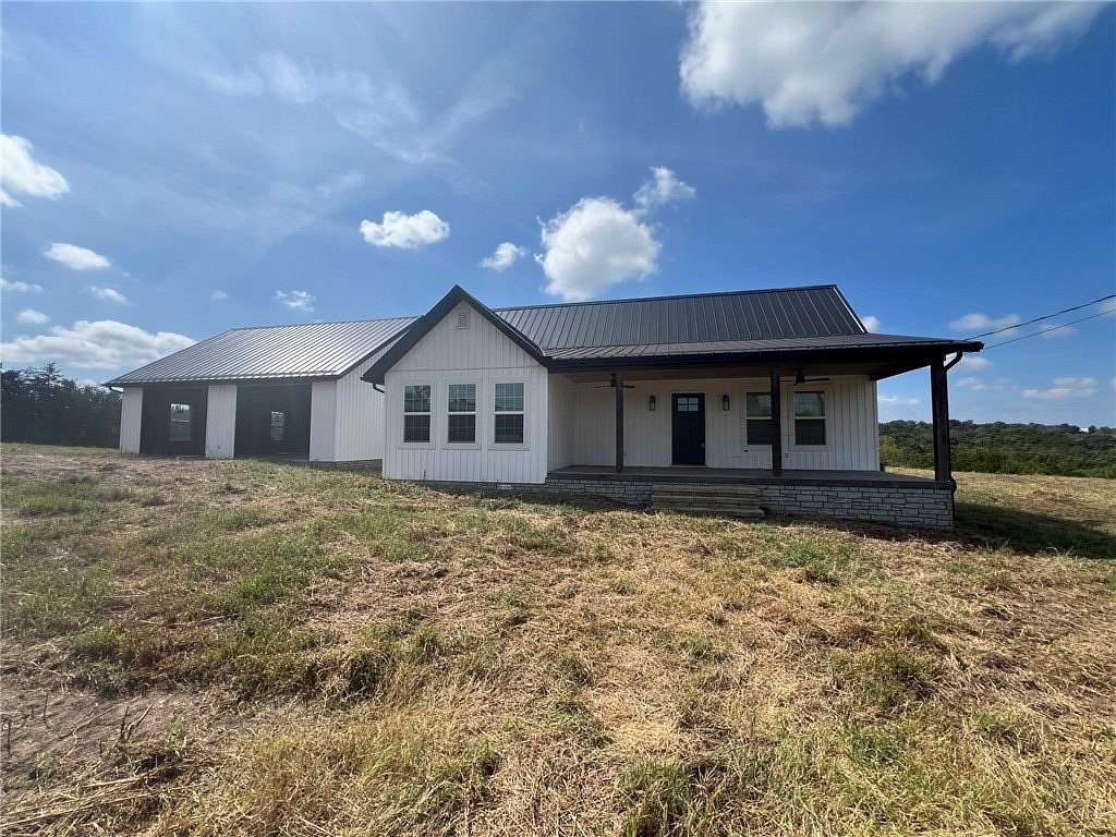 25.6 Acres of Land with Home for Sale in Lead Hill, Arkansas