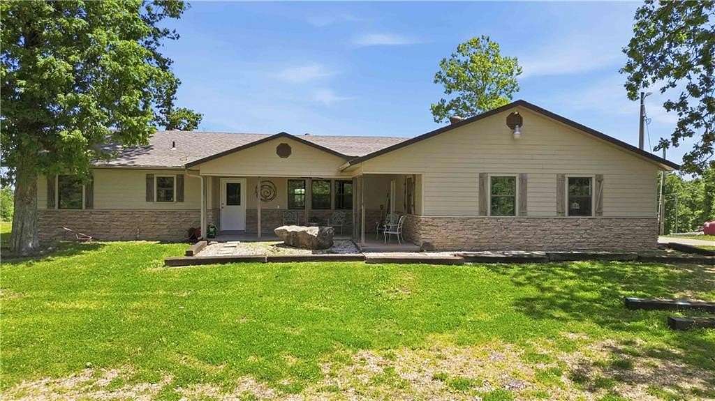 28 Acres of Recreational Land with Home for Auction in Siloam Springs, Arkansas