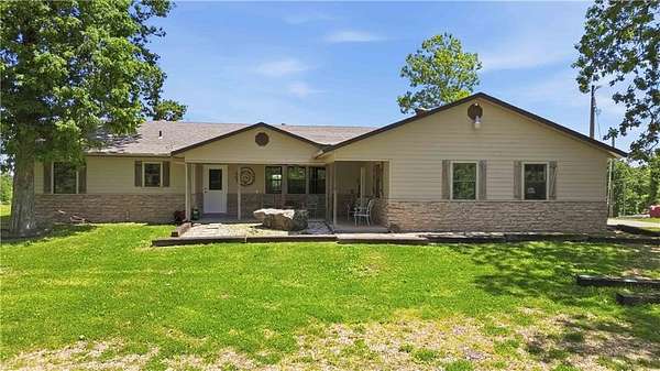 28 Acres of Recreational Land with Home for Auction in Siloam Springs, Arkansas