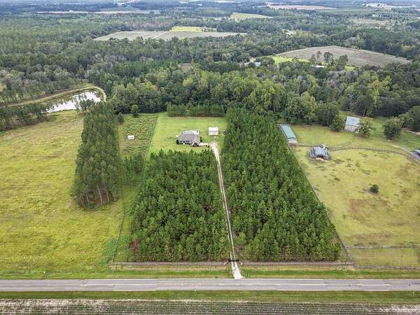 10.6 Acres of Land with Home for Sale in Adel, Georgia