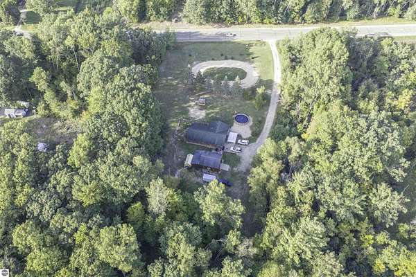 14 Acres of Land with Home for Sale in Edmore, Michigan