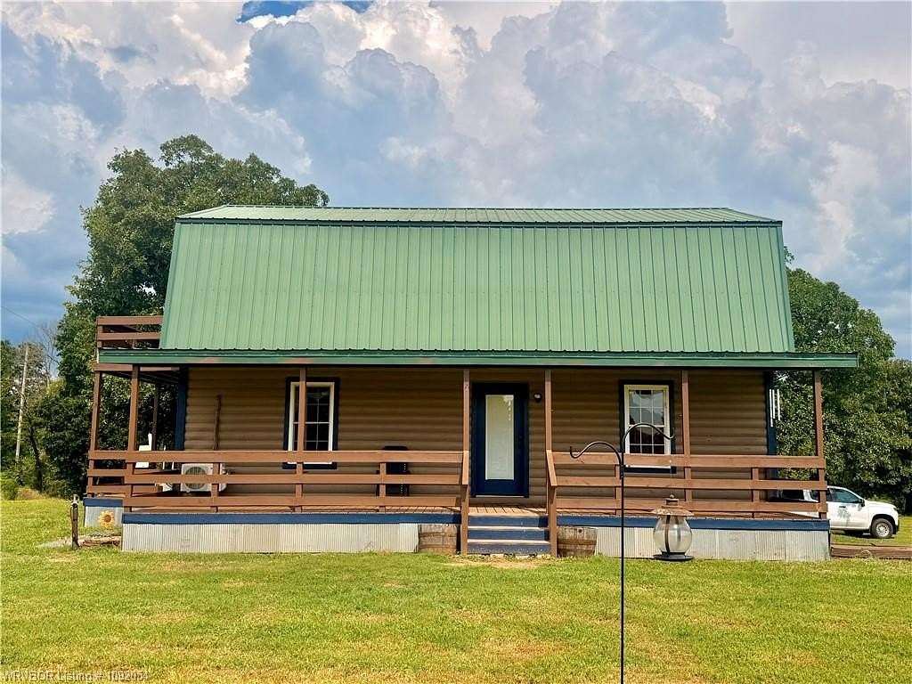 8 Acres of Land with Home for Sale in Muldrow, Oklahoma