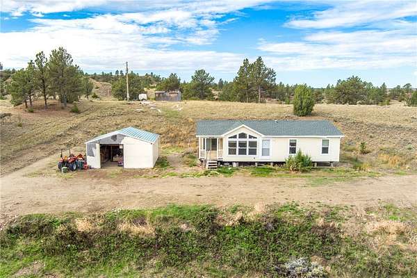 19.3 Acres of Land with Home for Sale in Roundup, Montana