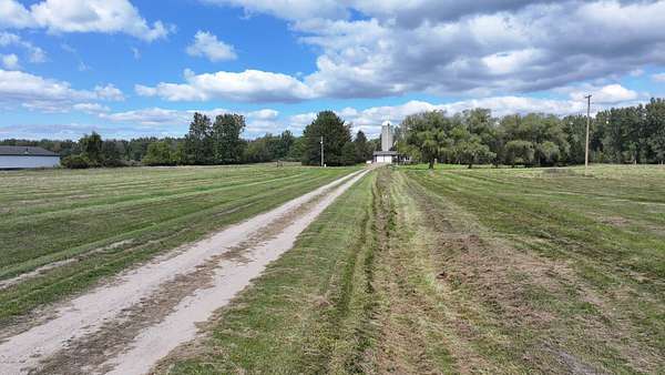 40 Acres of Land with Home for Auction in Shepherd, Michigan