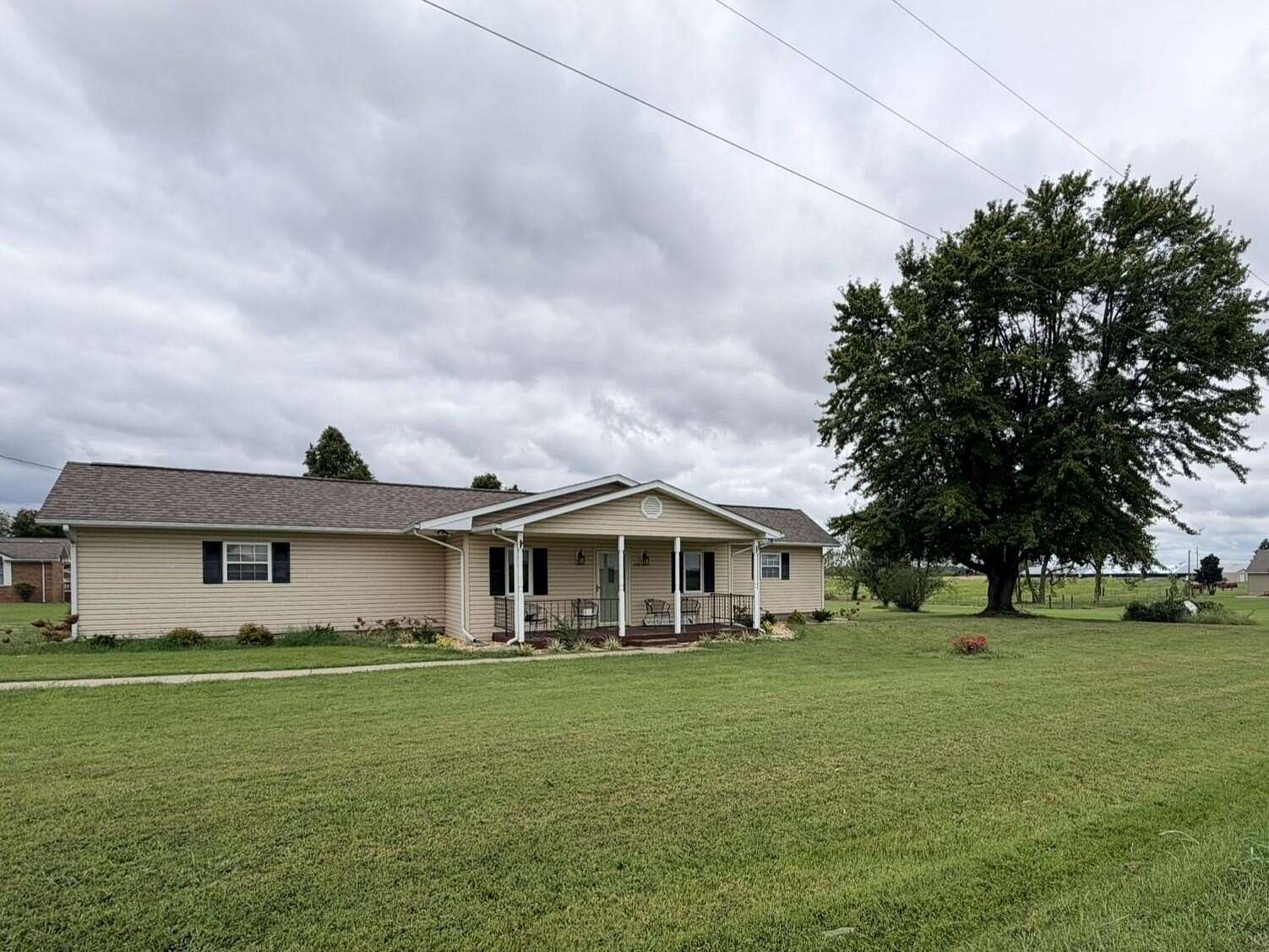1.63 Acres of Land with Home for Auction in Hickory, Kentucky