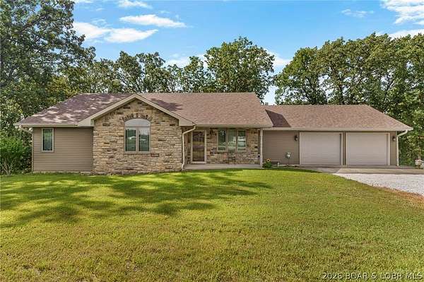 16.4 Acres of Land with Home for Sale in Eugene, Missouri