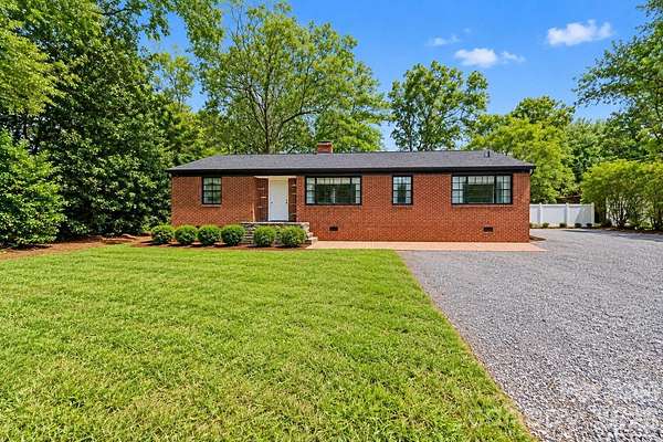 3.17 Acres of Land with Home for Sale in Huntersville, North Carolina