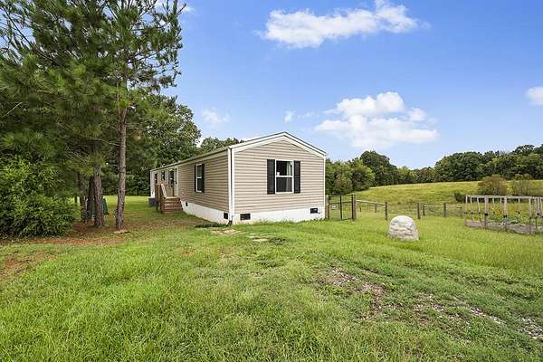3.84 Acres of Land with Home for Sale in Hodges, South Carolina