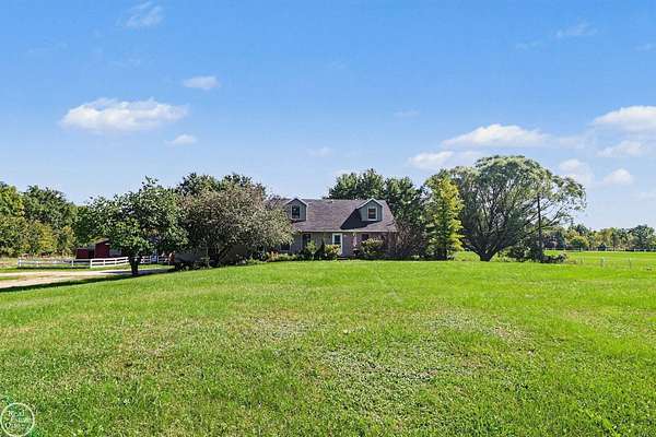 11 Acres of Recreational Land with Home for Sale in Groveland Township, Michigan