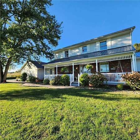 4.28 Acres of Land with Home for Sale in Lore City, Ohio