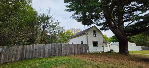 2 Acres of Land with Home for Sale in Rhodes, Michigan