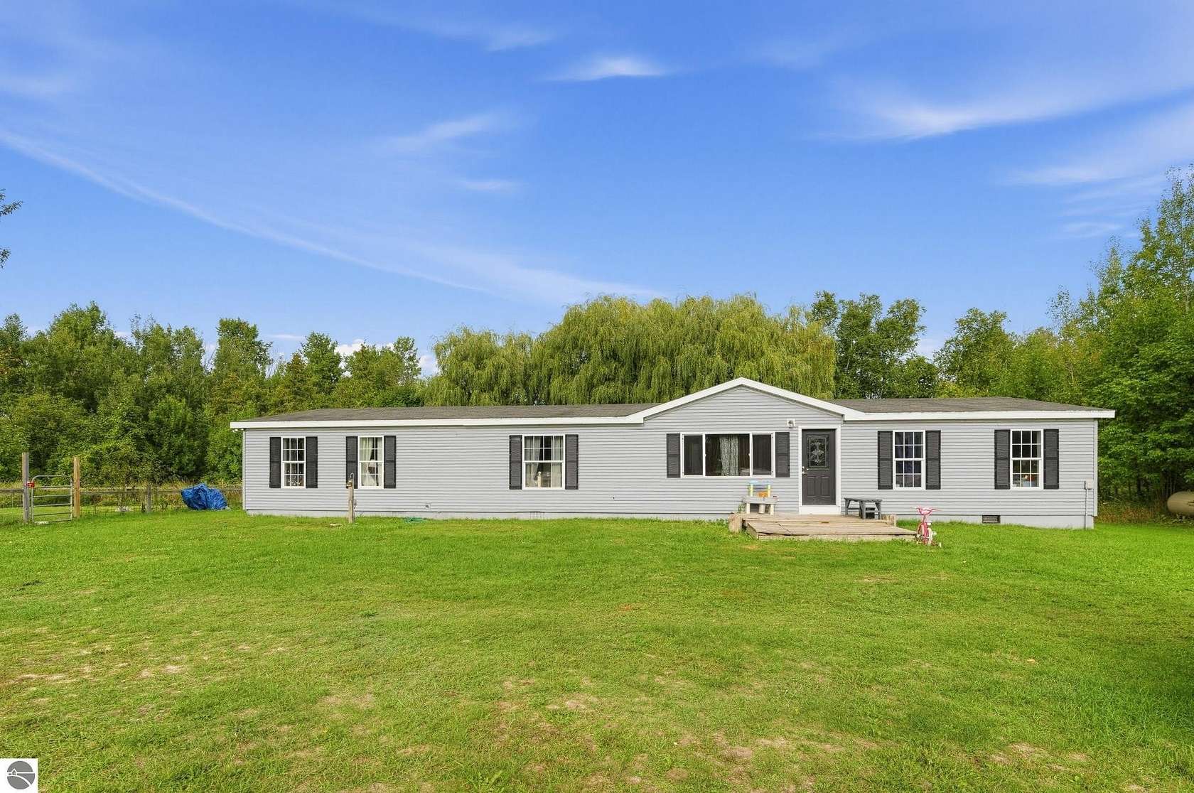 5 Acres of Land with Home for Sale in Charlevoix, Michigan