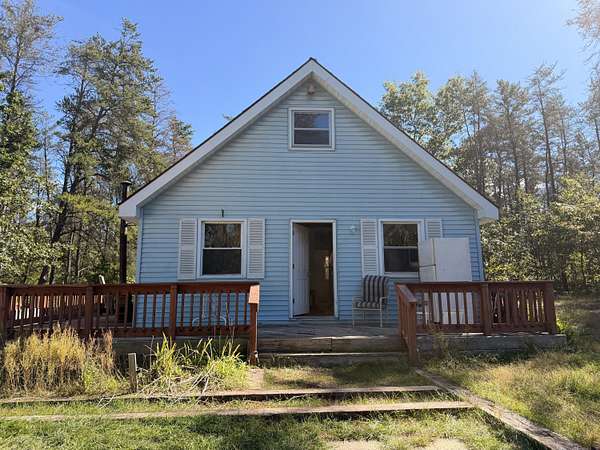 2.5 Acres of Land with Home for Sale in St. Helen, Michigan