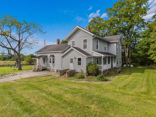 8 Acres of Land with Home for Sale in Osseo, Michigan