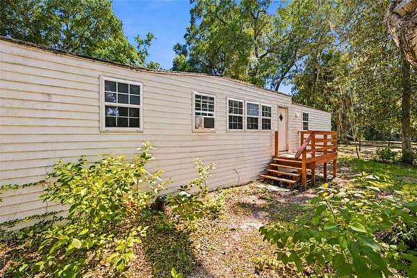 4.3 Acres of Land with Home for Lease in Anthony, Florida