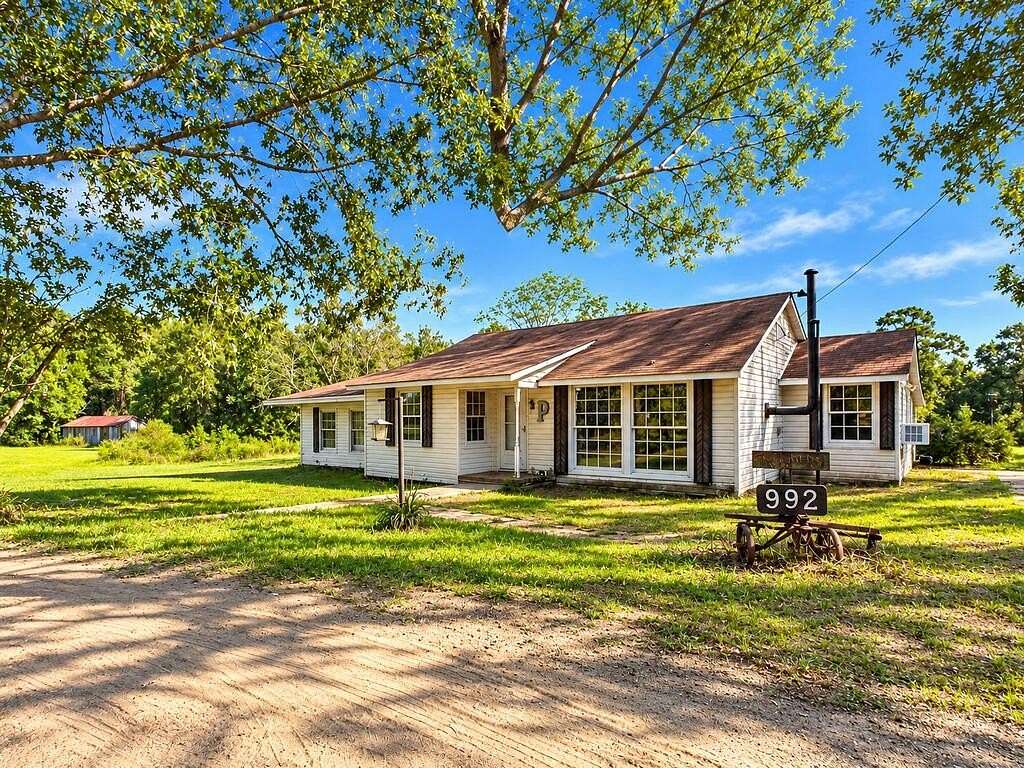 6.73 Acres of Land with Home for Sale in Huntington, Texas