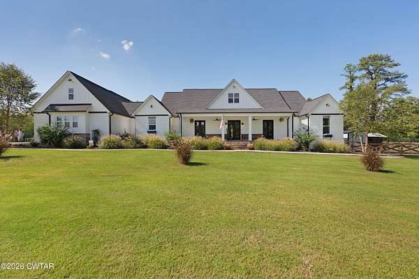 3.69 Acres of Land with Home for Sale in Milan, Tennessee