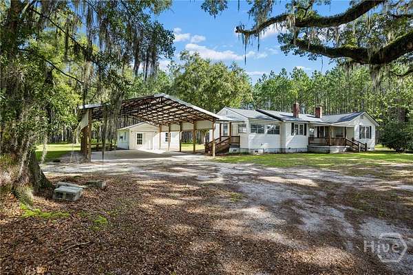 7.29 Acres of Land with Home for Sale in Ellabell, Georgia