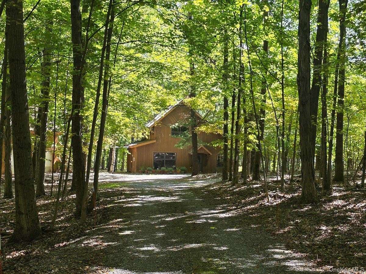 13 Acres of Land with Home for Sale in Durham, New York