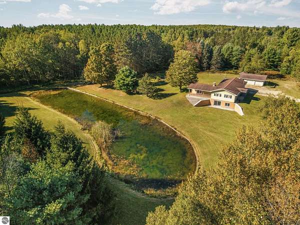 5 Acres of Land with Home for Sale in South Boardman, Michigan