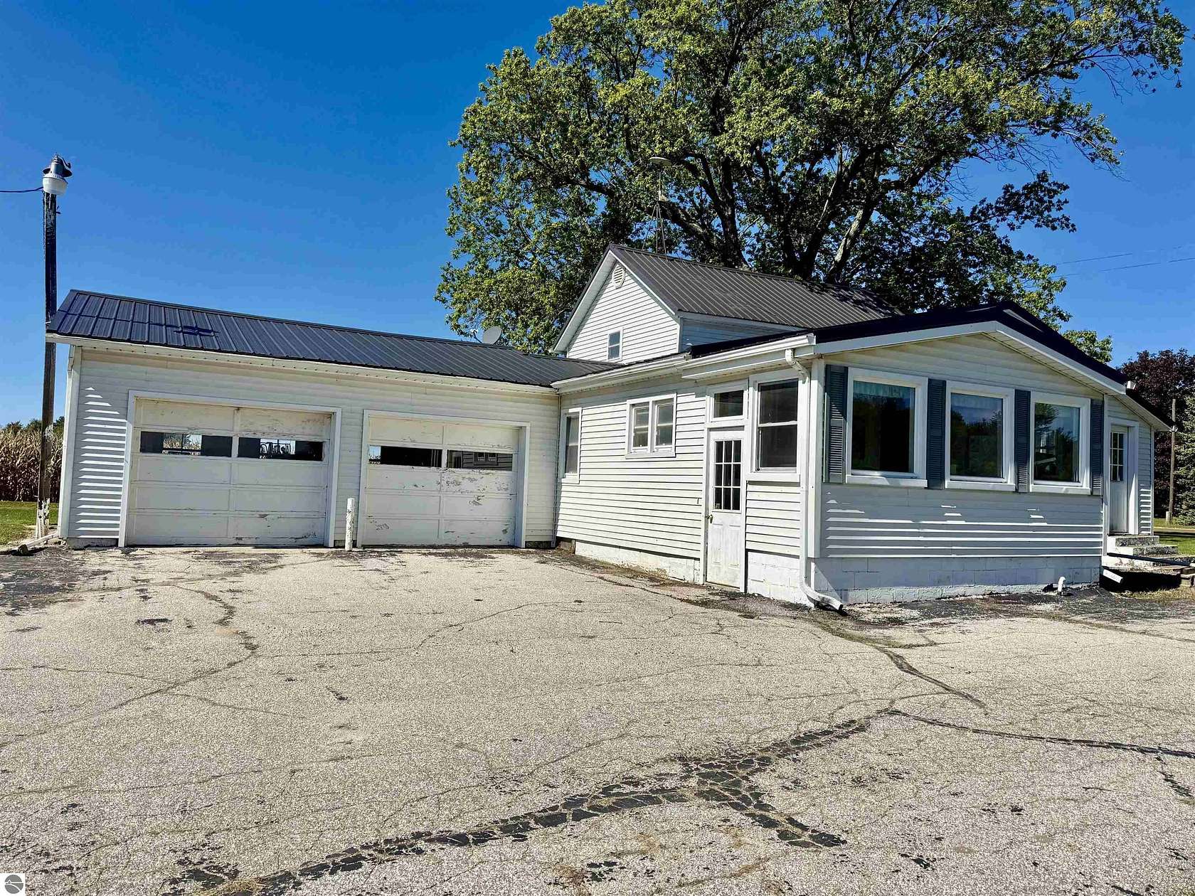 2 Acres of Land with Home for Auction in Ithaca, Michigan