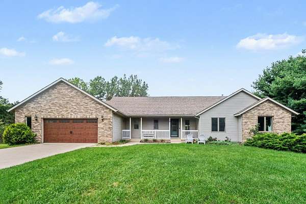 8.6 Acres of Land with Home for Sale in Rockford, Michigan