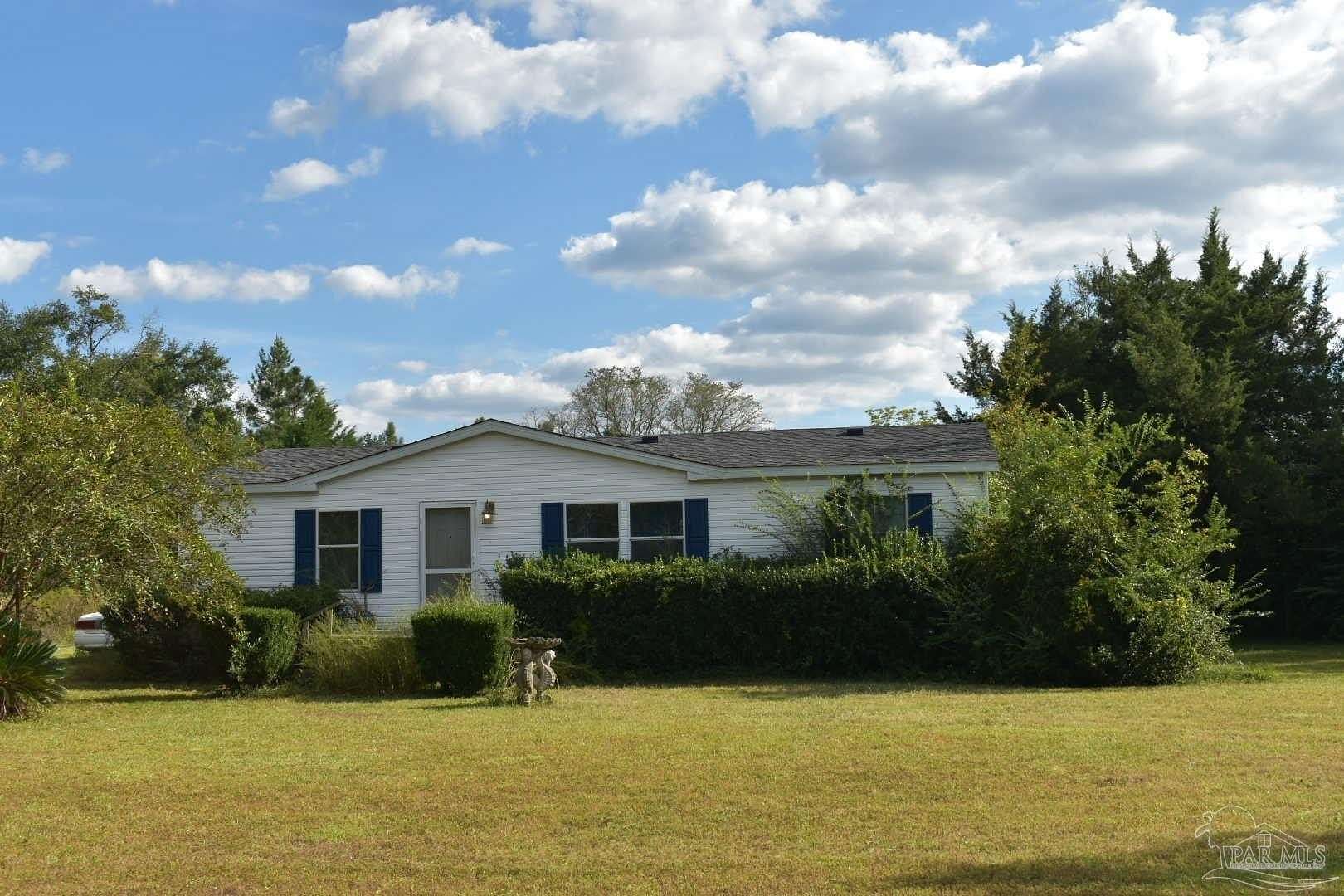 2.44 Acres of Land with Home for Sale in Milton, Florida