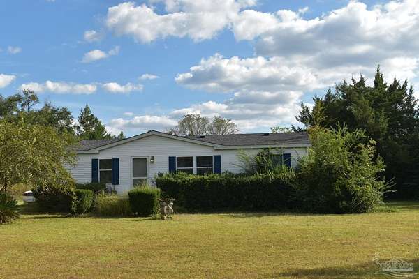 2.44 Acres of Land with Home for Sale in Milton, Florida