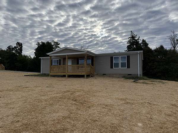 2.57 Acres of Land with Home for Sale in Red Boiling Springs, Tennessee