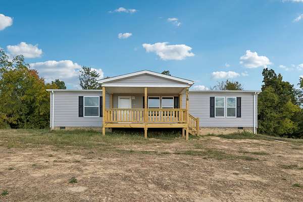 2.57 Acres of Land with Home for Sale in Red Boiling Springs, Tennessee