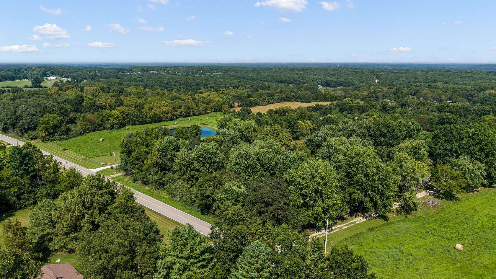 3.4 Acres of Land with Home for Auction in Holts Summit, Missouri