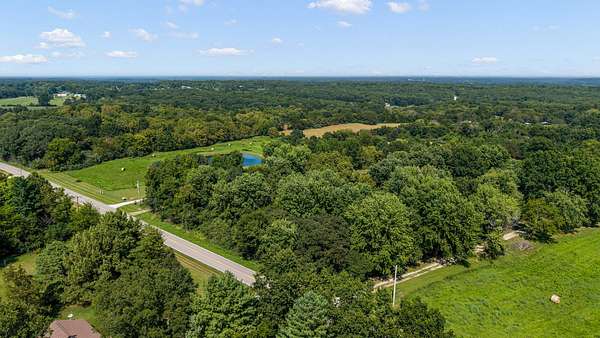 3.4 Acres of Land with Home for Auction in Holts Summit, Missouri