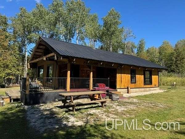 2 Acres of Land with Home for Sale in Cornell, Michigan