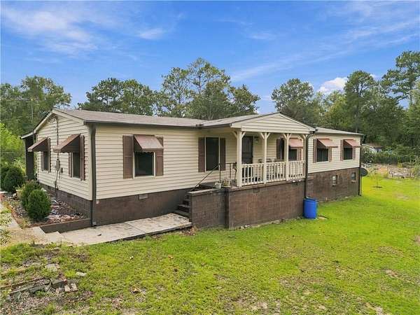 2.47 Acres of Land with Home for Sale in Seale, Alabama