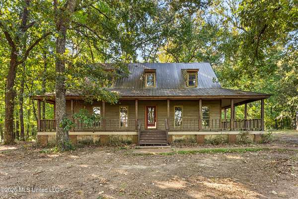 4.79 Acres of Land with Home for Sale in Holly Springs, Mississippi