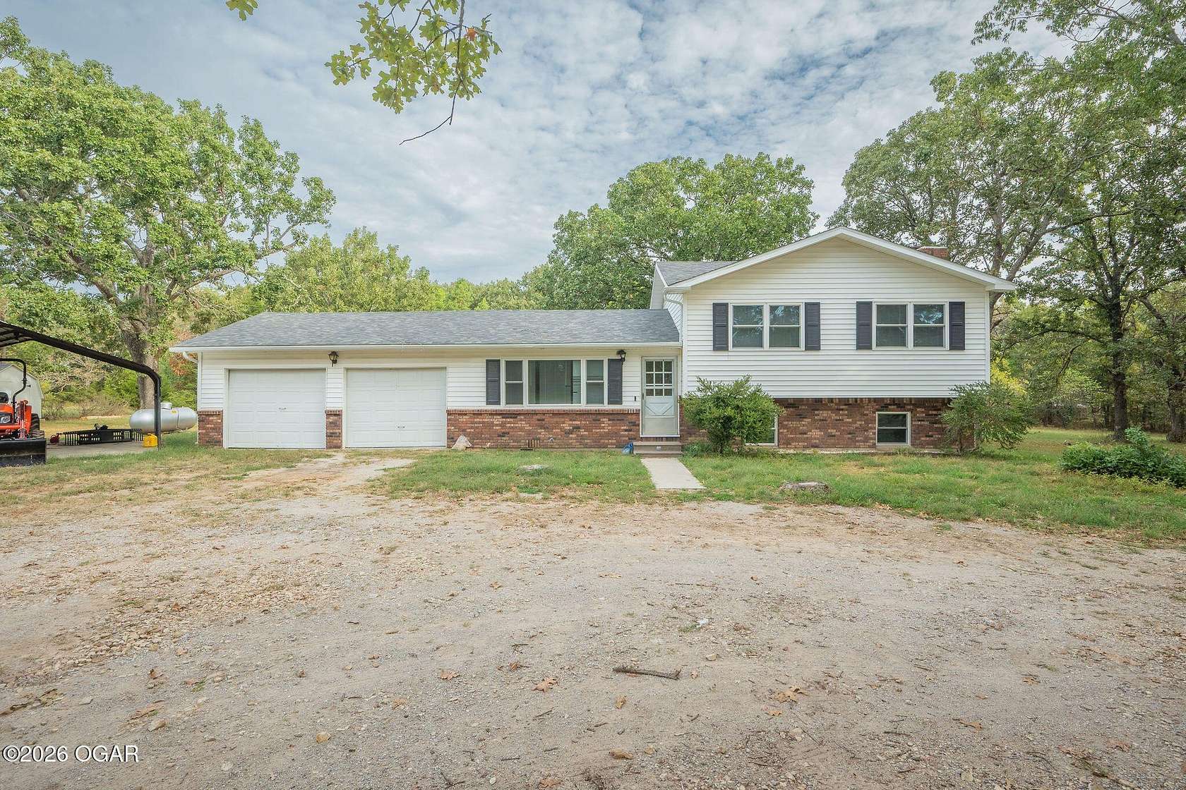 10 Acres of Land with Home for Sale in Goodman, Missouri