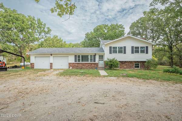 10 Acres of Land with Home for Sale in Goodman, Missouri