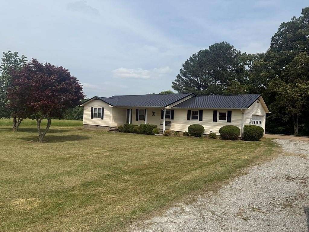 10 Acres of Land with Home for Sale in McKenzie, Tennessee