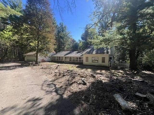 10 Acres of Land with Home for Sale in Harrison, Michigan