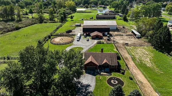 5.32 Acres of Land with Home for Sale in Mogadore, Ohio