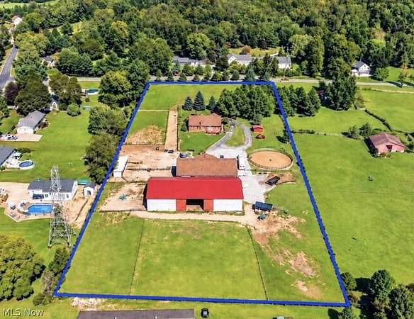 5.32 Acres of Land with Home for Sale in Mogadore, Ohio