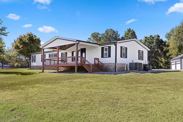 5 Acres of Land with Home for Sale in Bethpage, Tennessee