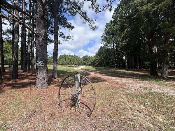 7.12 Acres of Land with Home for Sale in Lillington, North Carolina